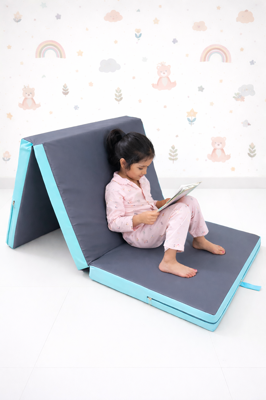 Soft crash pad for kids used as cozy lounging and reading space in modern home